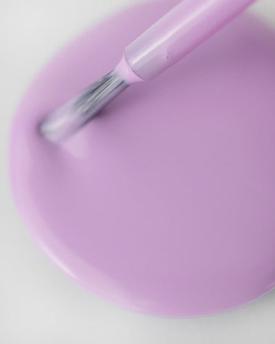 Mid-tone lilac nail polish drop by sienna