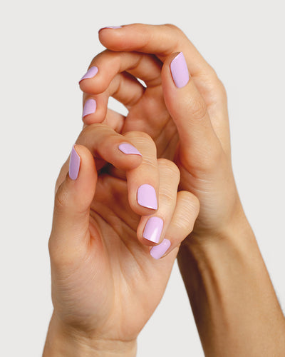 lilac purple nail polish hand swatch on fair skin tone