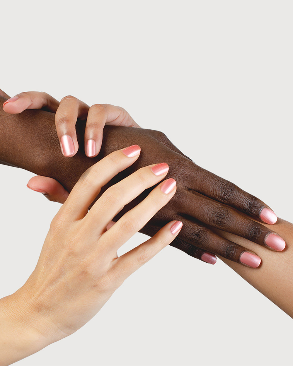 Warm Pink Satin Nail Polish on Fair Skin Tone, Dark Skin Tone.