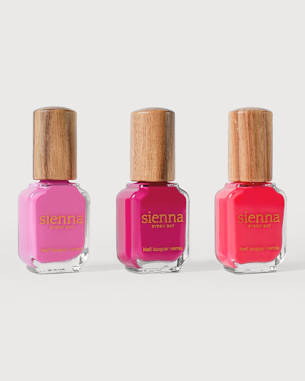 Vibrant Pinks Nail Polish Bottes with timber caps