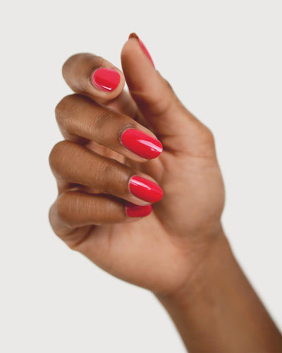 bright topaz pink nail polish swatch on medium skin tone by sienna