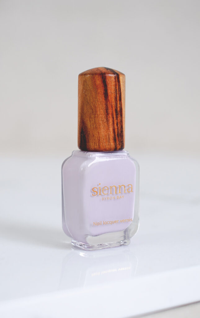 pastel purple-grey nail polish bottle with timber cap by sienna