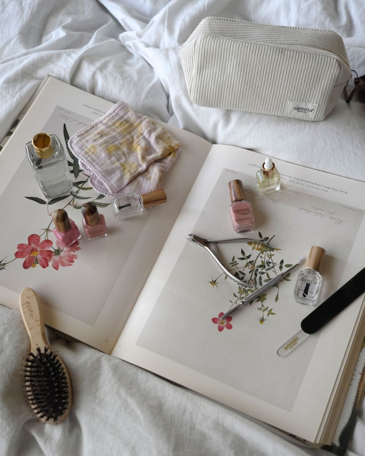 Goodness Gift Set ritual scattered over a beautiful book of flowers