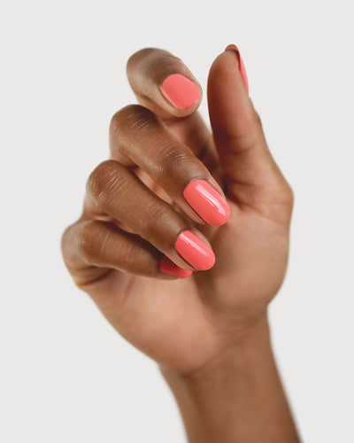 Grapefruit Pink nail polish swatch on Medium Skin tone by Sienna Byron Bay