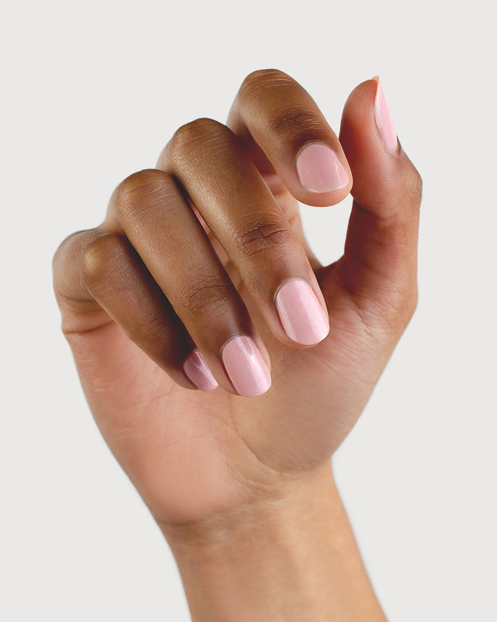 Shimmering Cherry Blossom Nail Polish on Medium Skin Tone