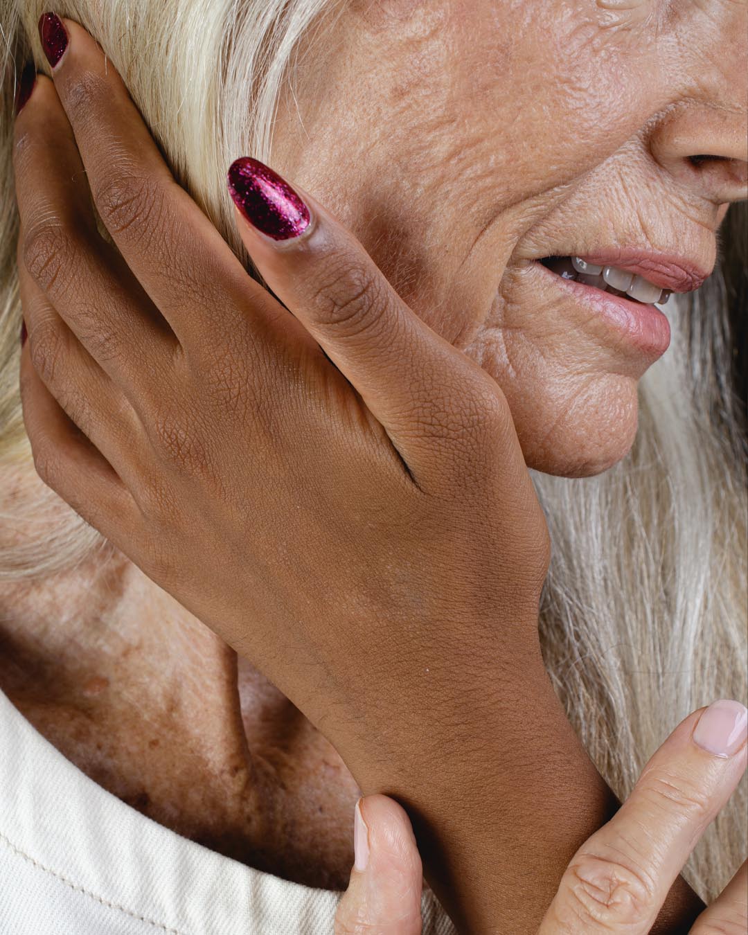 Medium skin tone hand wearing Starlit Rose ail glaze