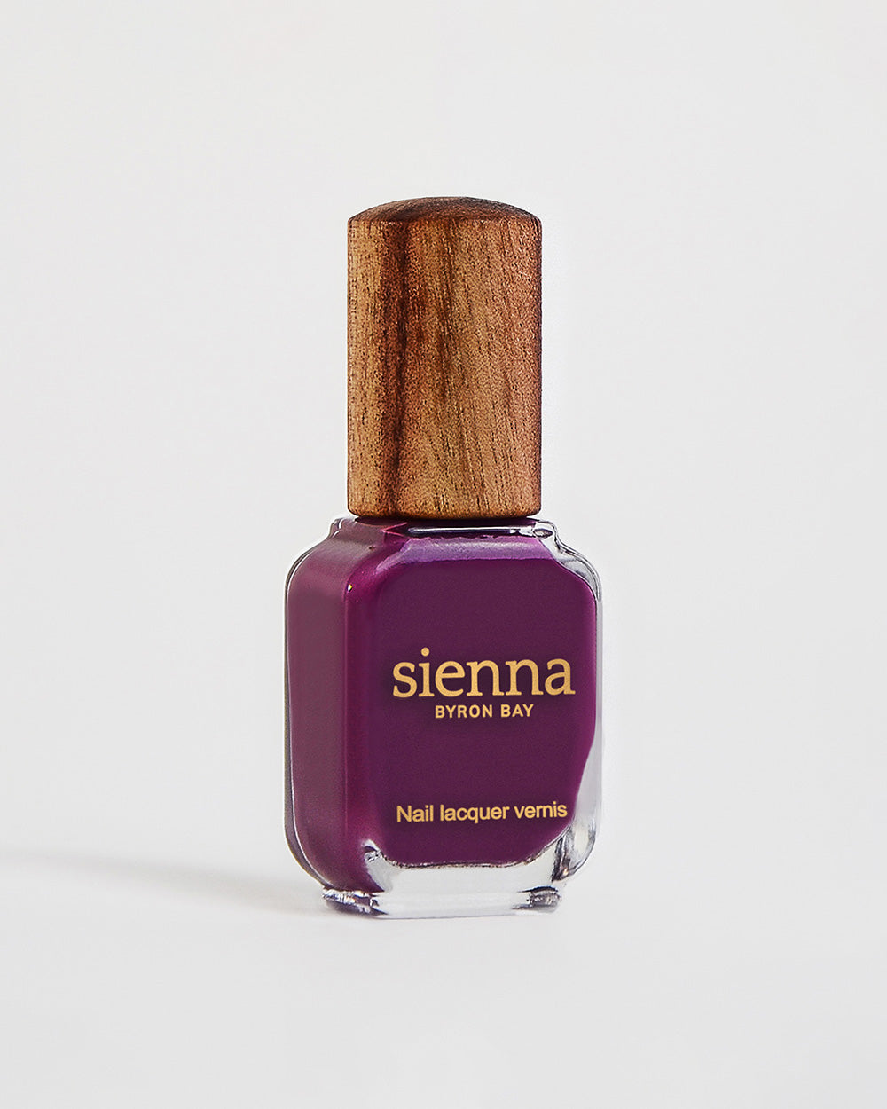 Reverence Violet Grape Crème nail polish bottle by Sienna Byron Bay.