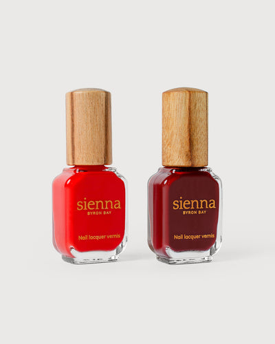 bright red and organic mid-tone red nail polish glass bottles with timber caps