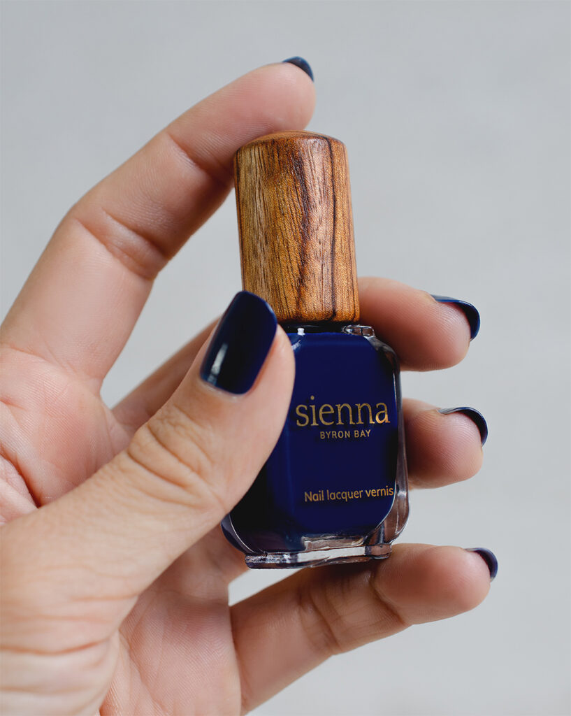 navy blue nail polish hand swatch on fair skin tone by sienna