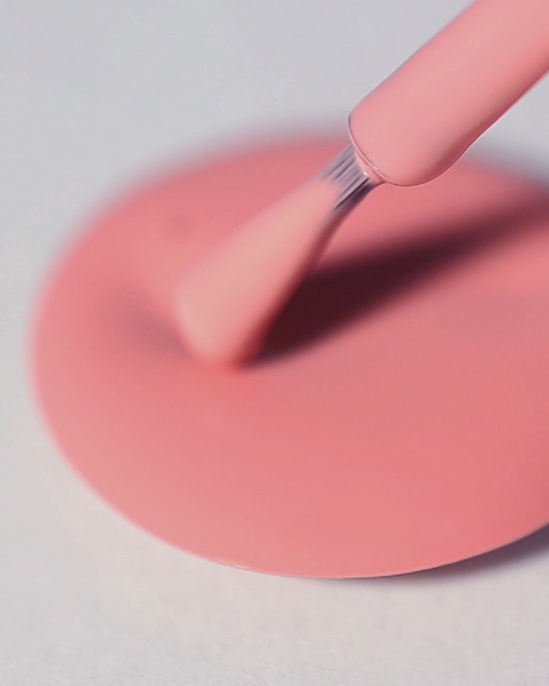 peachy pink nail polish swirl