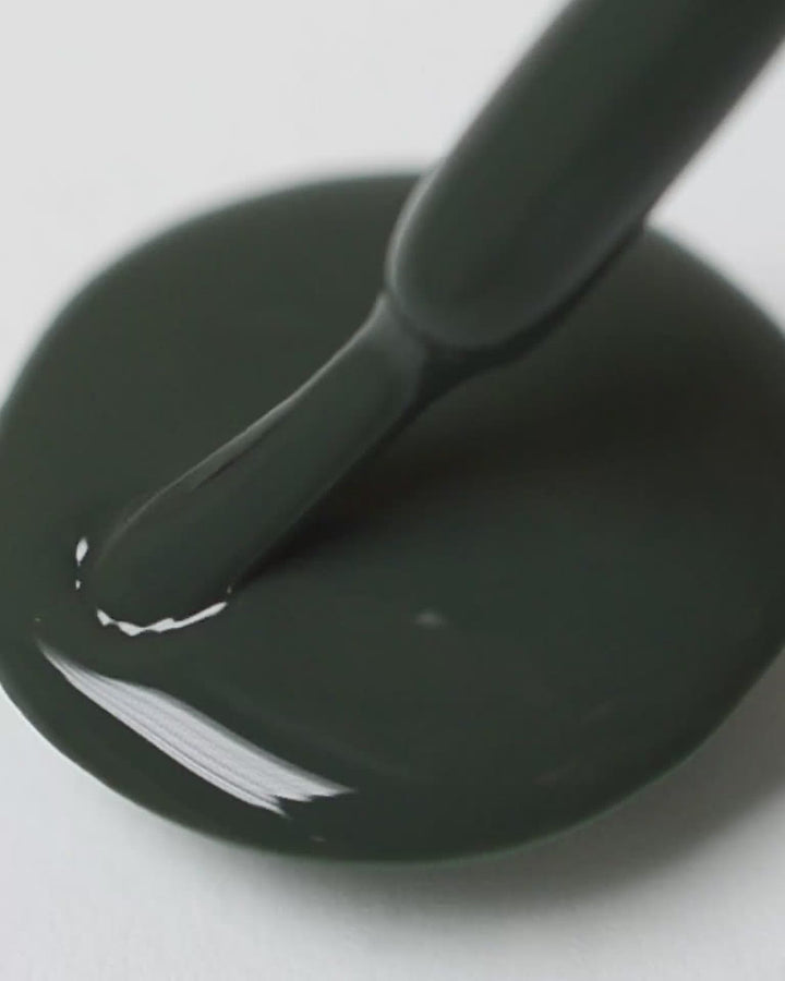 deep olive green nail polish drop by sienna