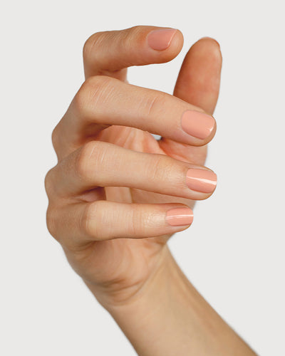 English rose nail polish hand swatch on fair skin tone up-close