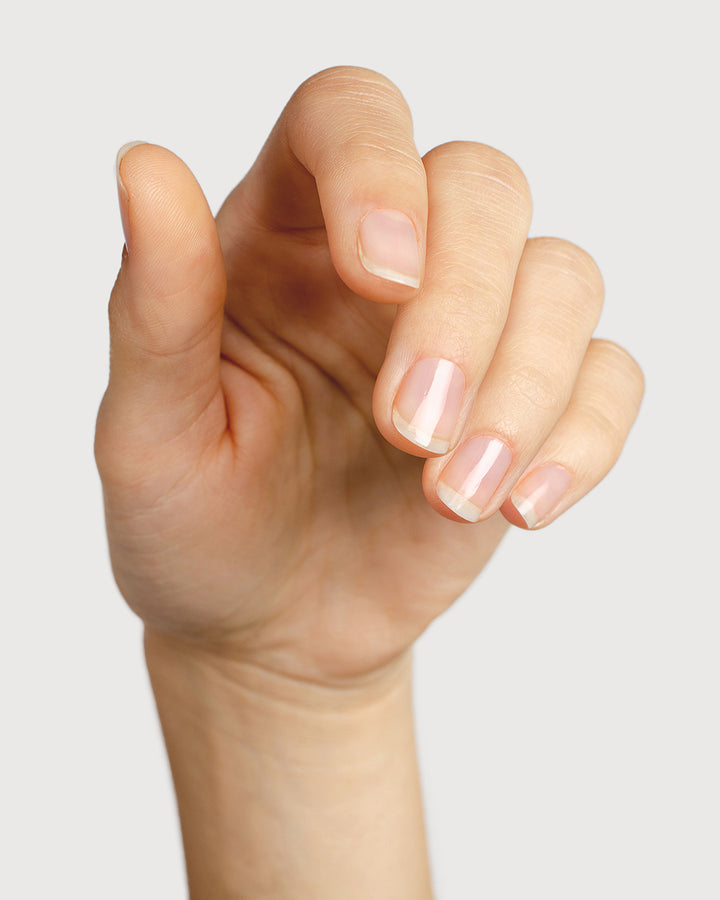    transparent base and top coat  hand swatch on fair skin tone by sienna