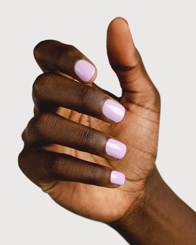 lilac purple nail polish hand swatch on dark skin tone