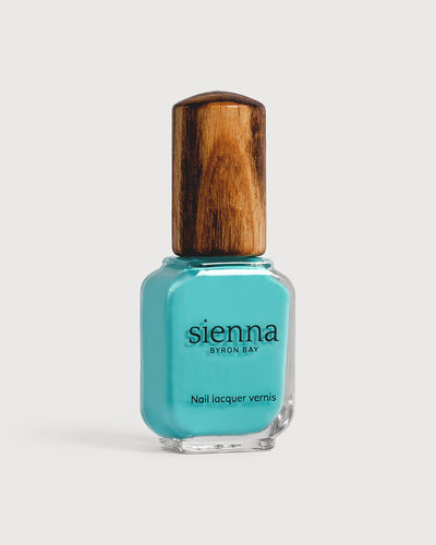 Turquoise aqua nail polish glass bottle with timber cap