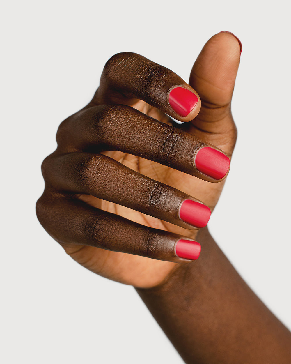 clear matte top coat nail polish hand swatch on dark skin tone