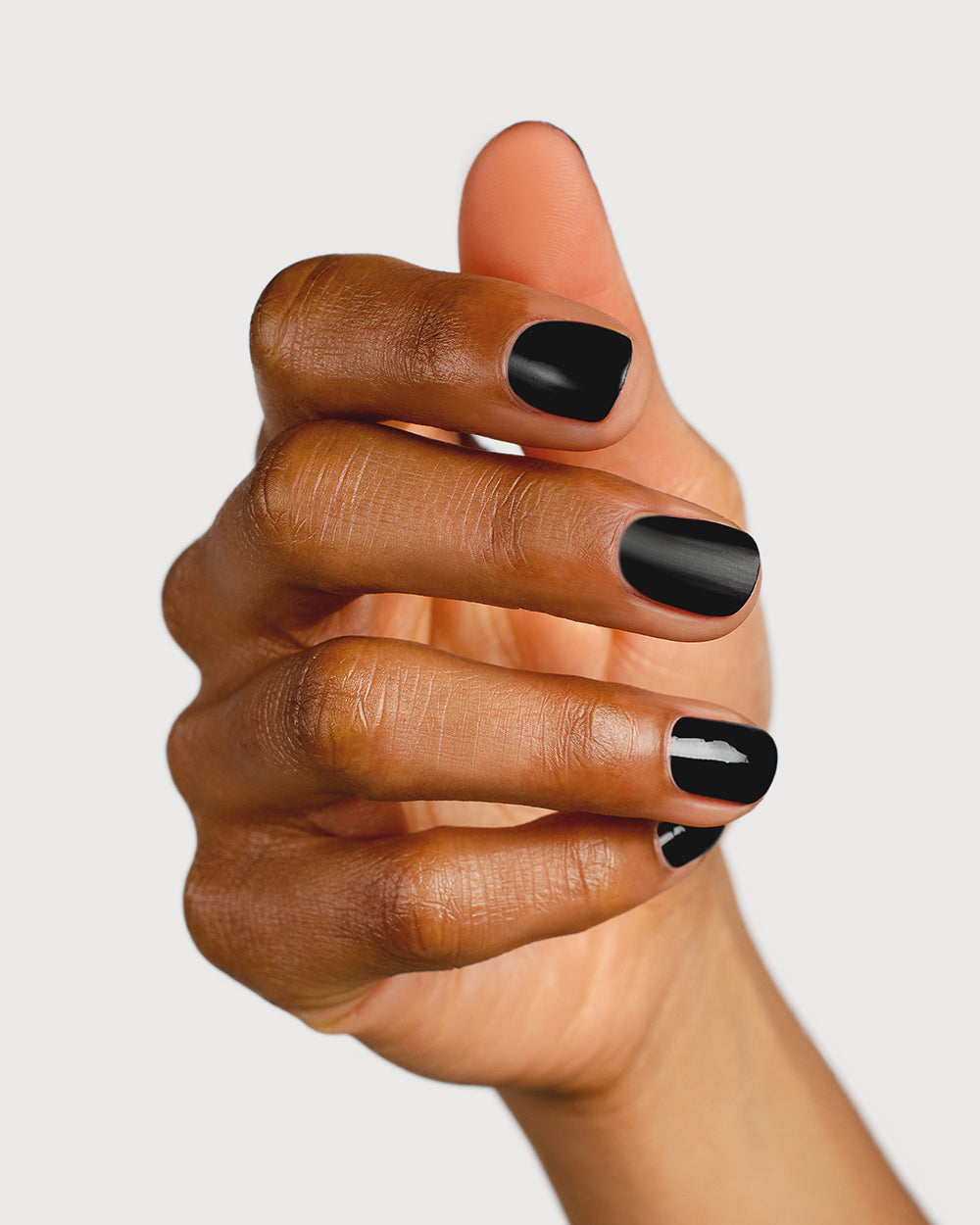 clear matte top coat nail polish hand swatch on medium skin tone