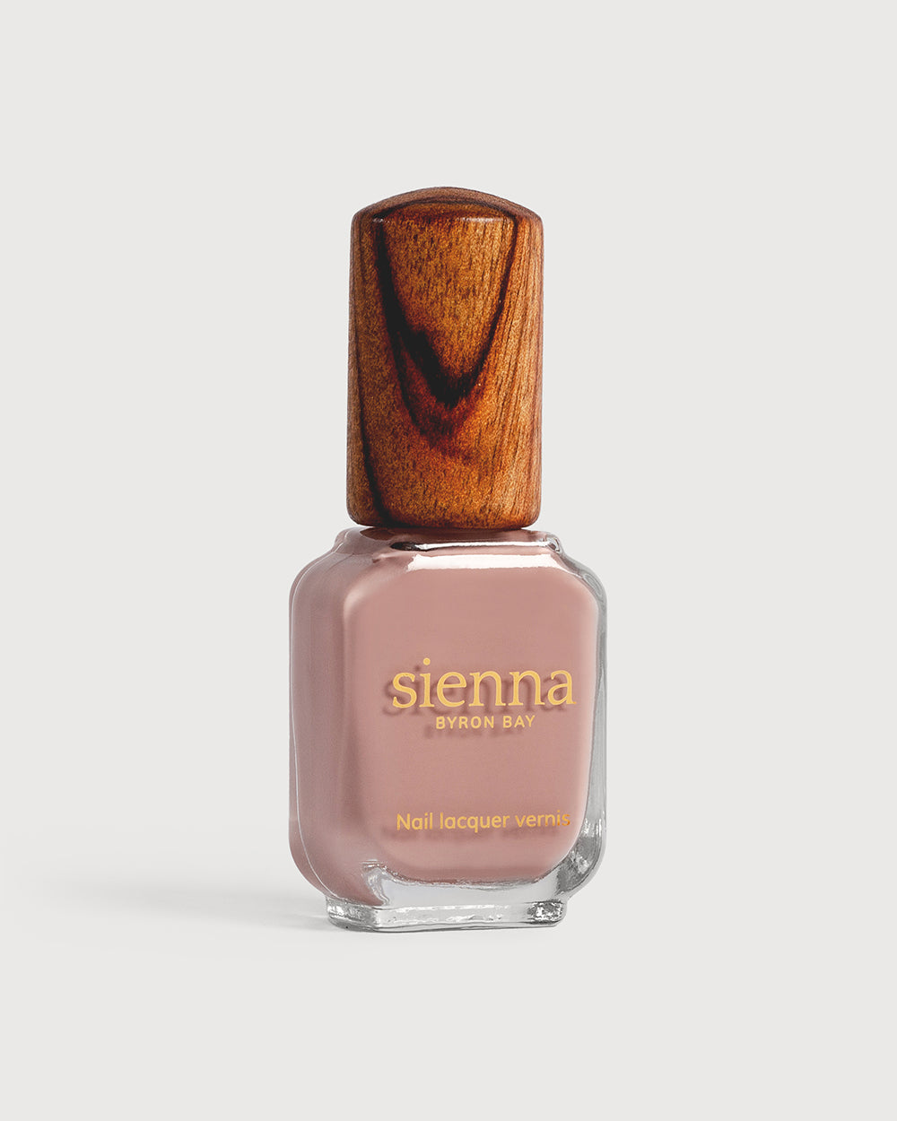 Dusty rose nail polish glass bottle with timber cap