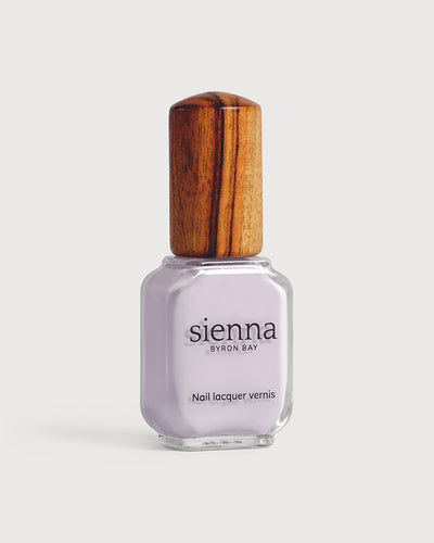 light lilac pastel nail polish bottles with timber cap