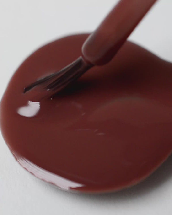 Deep burnt umber nail polish drop by sienna