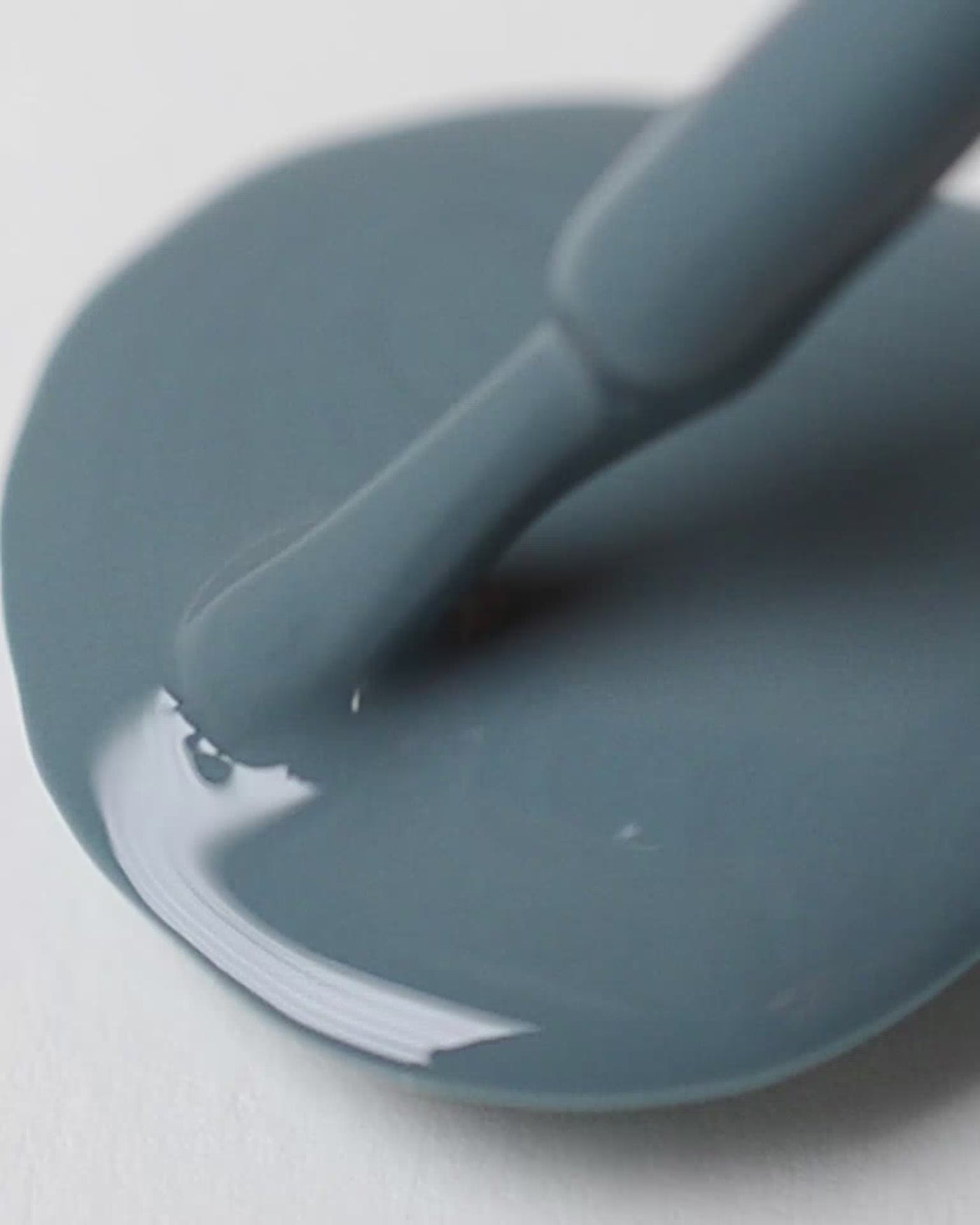 Mid grey-blue nail polish drop by sienna