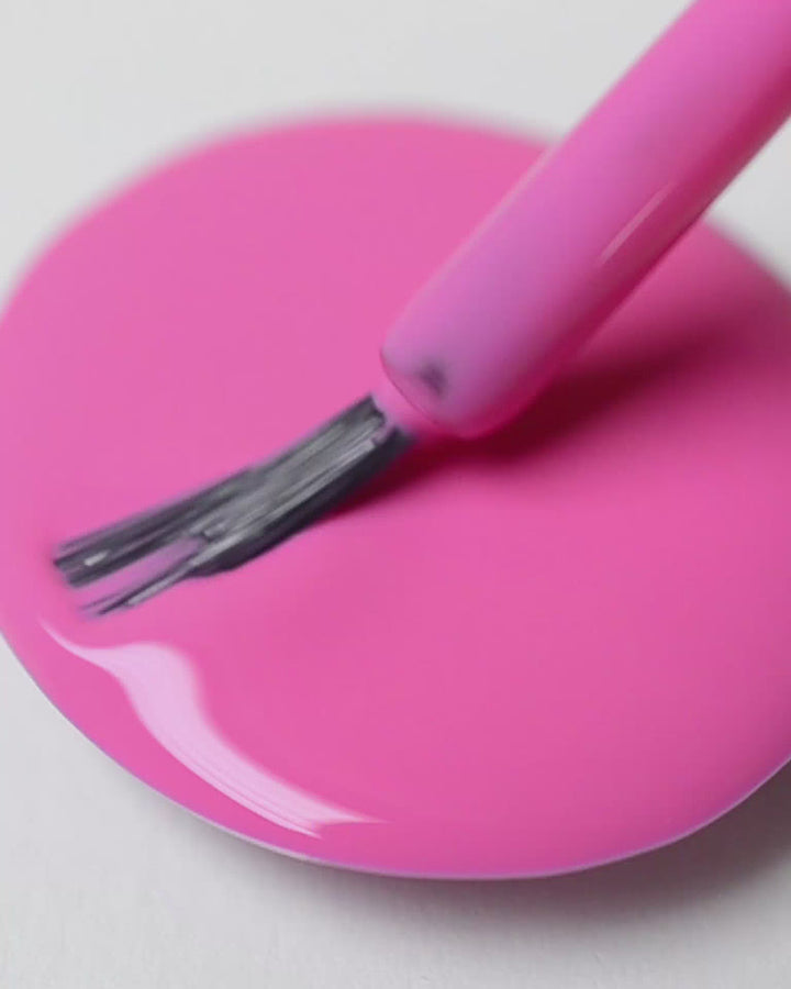 Bright mid-tone fuchsia nail polish drop by sienna