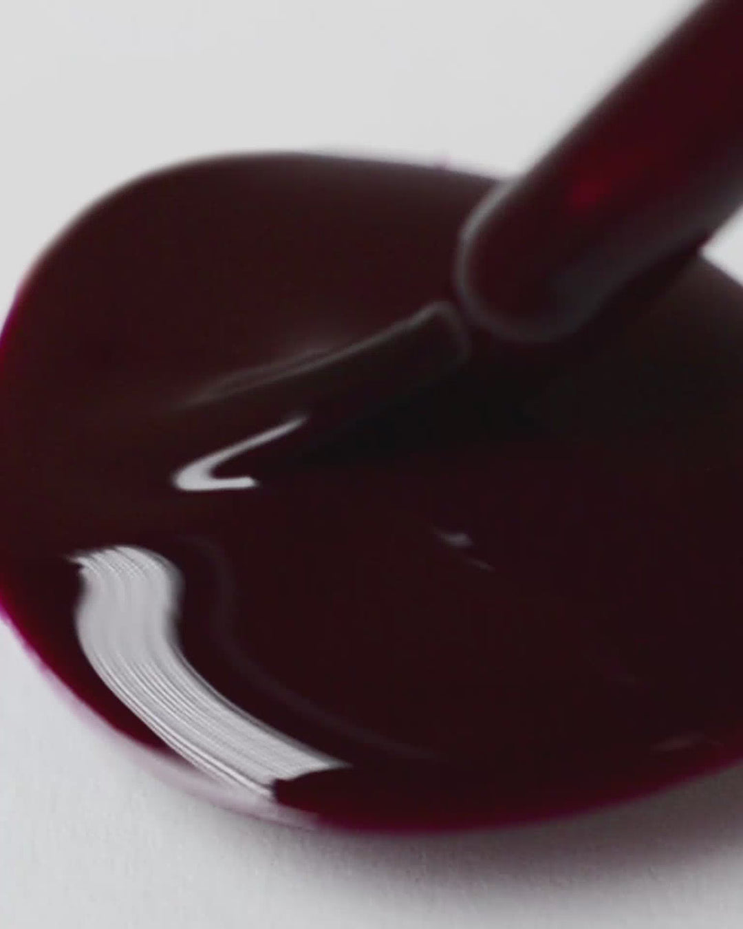dark red nail polish drop by sienna